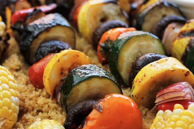 Vegan Harissa Grilled Veggie Kabobs with Corn Over Couscous