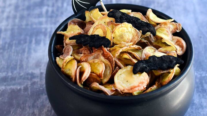 Potato chips made from yellow fingerling potatoes with halloween decorative bat chips made with